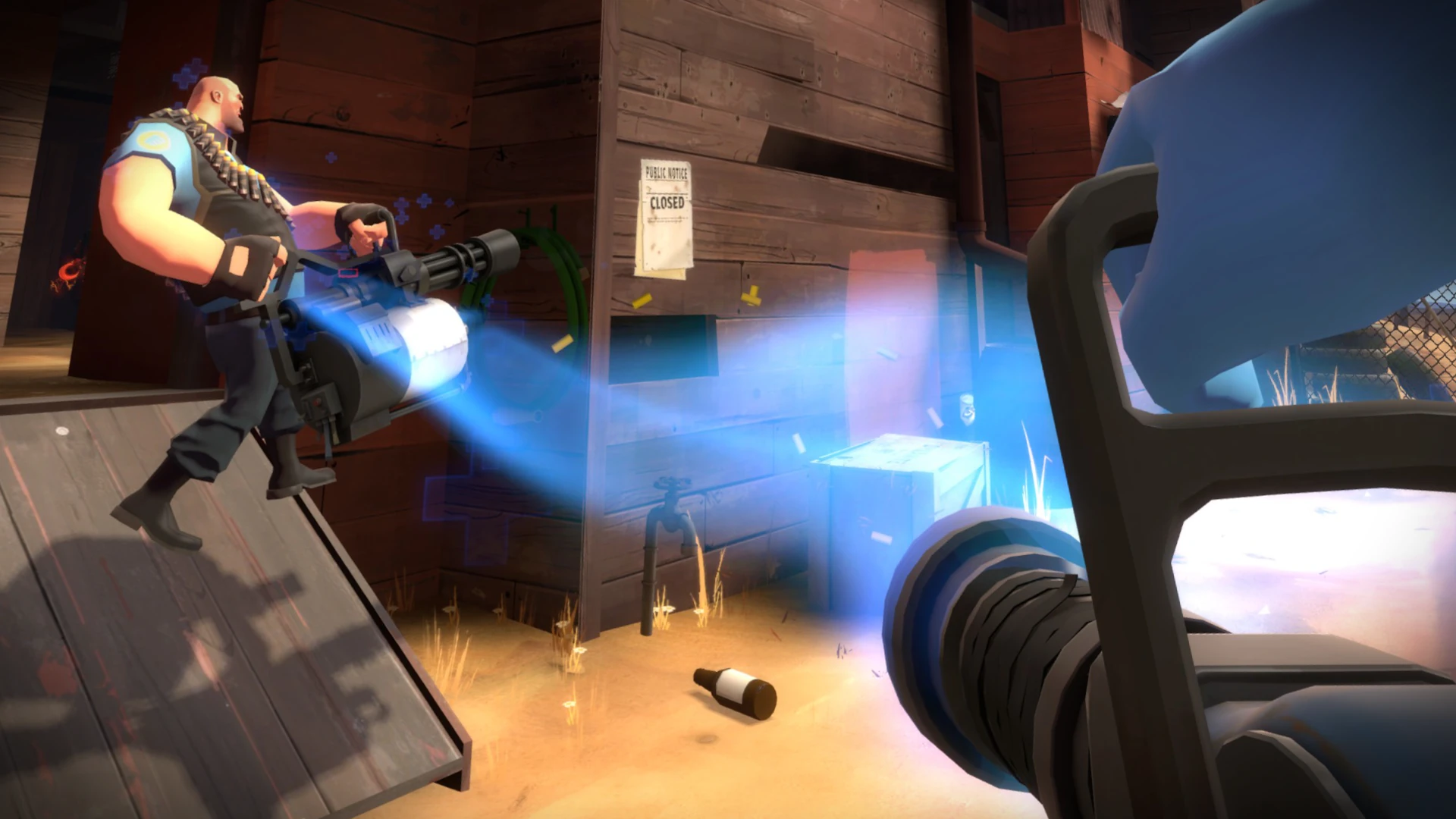 Medic holding a healing beam on a teammate